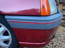Burgundy car repaired front bumper