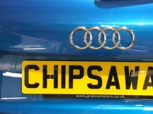 ChipsAway rear number plate on blue audi