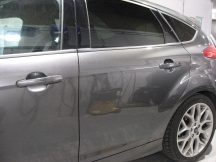 Side view of metallic grey car