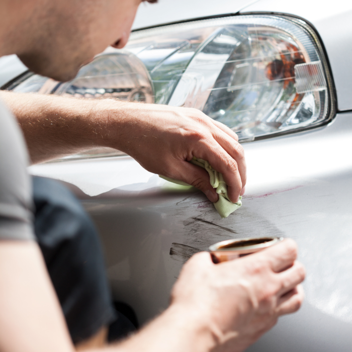 man repairing bumper scuff, diy bumper repair, repairing a bumper, repair a bumper, bumper fix, bumper broken repair, damaged bumper repair