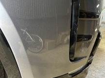 Grey car repair to front bumper